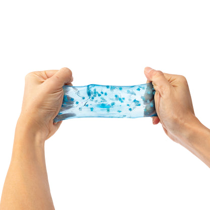 Sensory Sprouts Snowflake Jelly Cube blue squishy sensory fidget toy filled with floating snowflakes for tactile play, stress relief and sensory exploration.